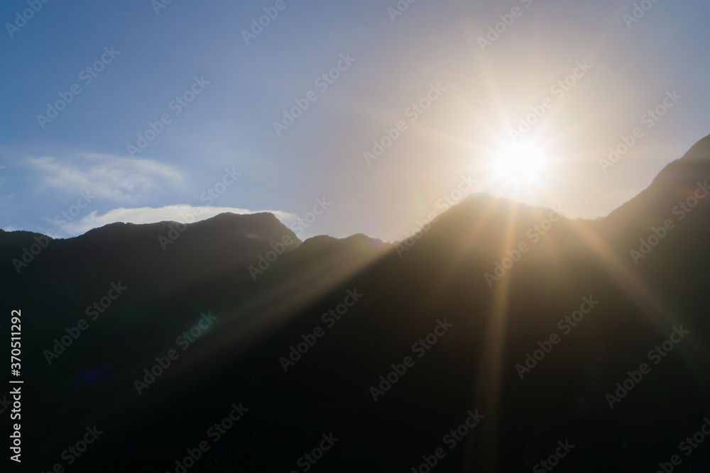 Sunrise over the top of the mountains