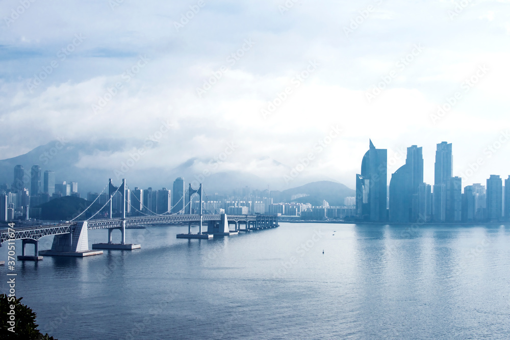 Naklejka premium The beautiful beach and bay with thick mist blow from the sea to the land.