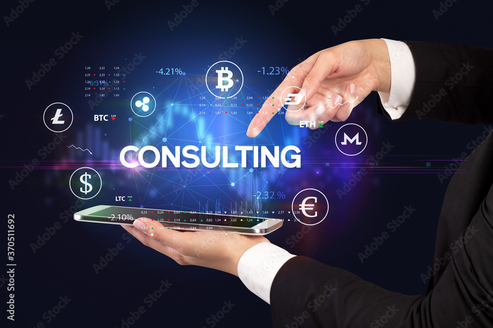 Close-up of a touchscreen with CONSULTING inscription, business opportunity concept Close-up of a touchscreen with CONSULTING inscription, business opportunity concept