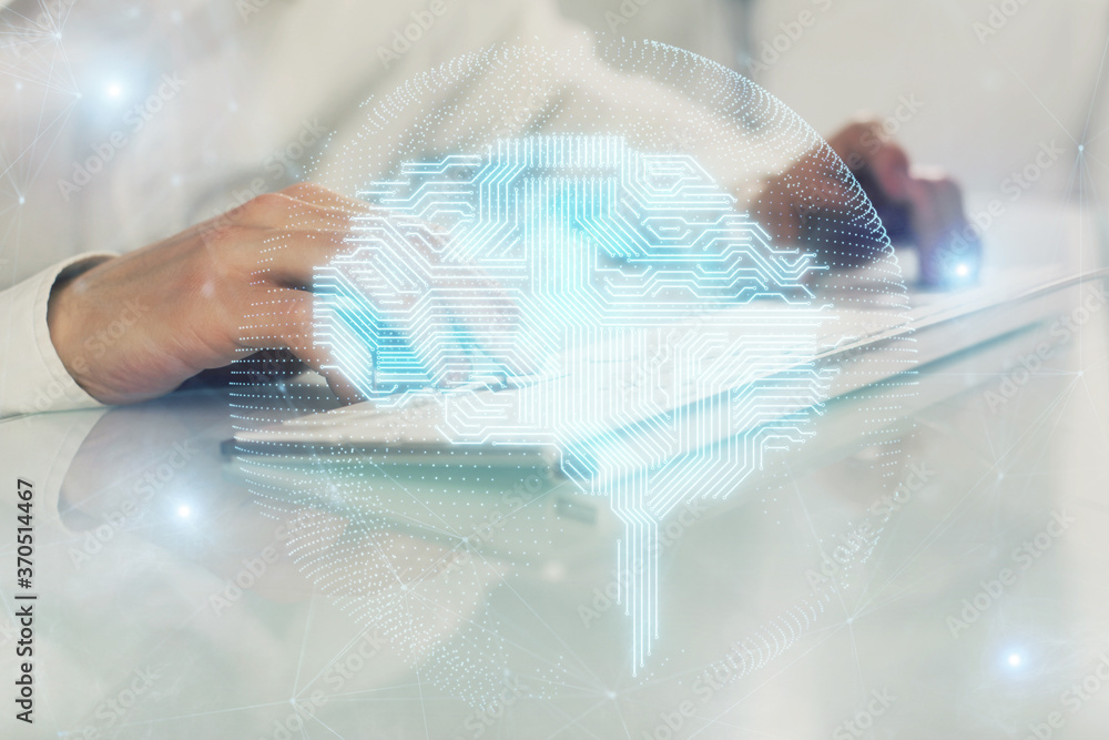 Fototapeta premium Man with computer background with brain theme hologram. Concept of brainstorm. Double exposure.