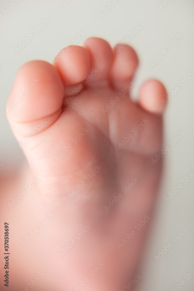 Foot of a newborn baby. Family concept. Props for little baby photoshoot. Foot of a newborn baby. Family concept. Props for little baby photoshoot.