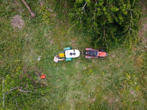Aerial view of spraying in the Cherry Orchard. Selected focus.