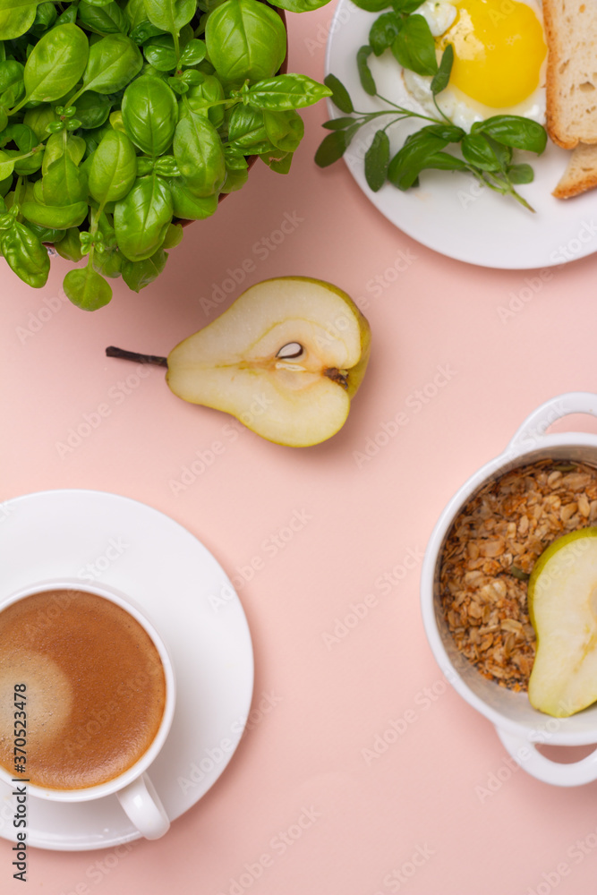 breakfast of eggs, black coffee and granola. breakfast of eggs, black coffee and granola.