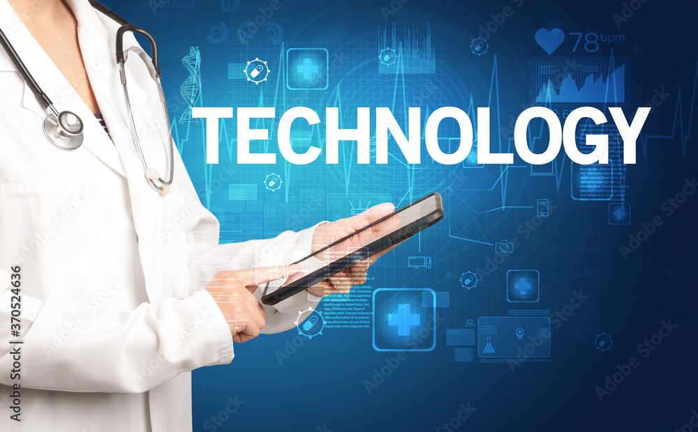 young doctor writing down notes with TECHNOLOGY inscription, healthcare concept young doctor writing down notes with TECHNOLOGY inscription, healthcare concept
