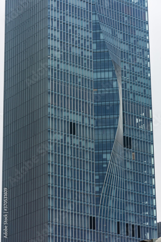 SHENZHEN, CHINA, 02 JANUARY 2020: The twisted skyscraper of Shenzhen business district, symbol of environmental sustainability