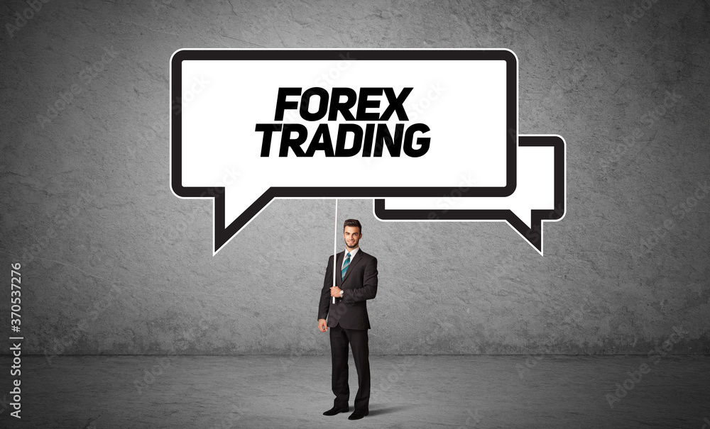 Young business person in casual holding road sign with FOREX TRADING inscription, new business idea concept Young business person in casual holding road sign with FOREX TRADING inscription, new business idea concept