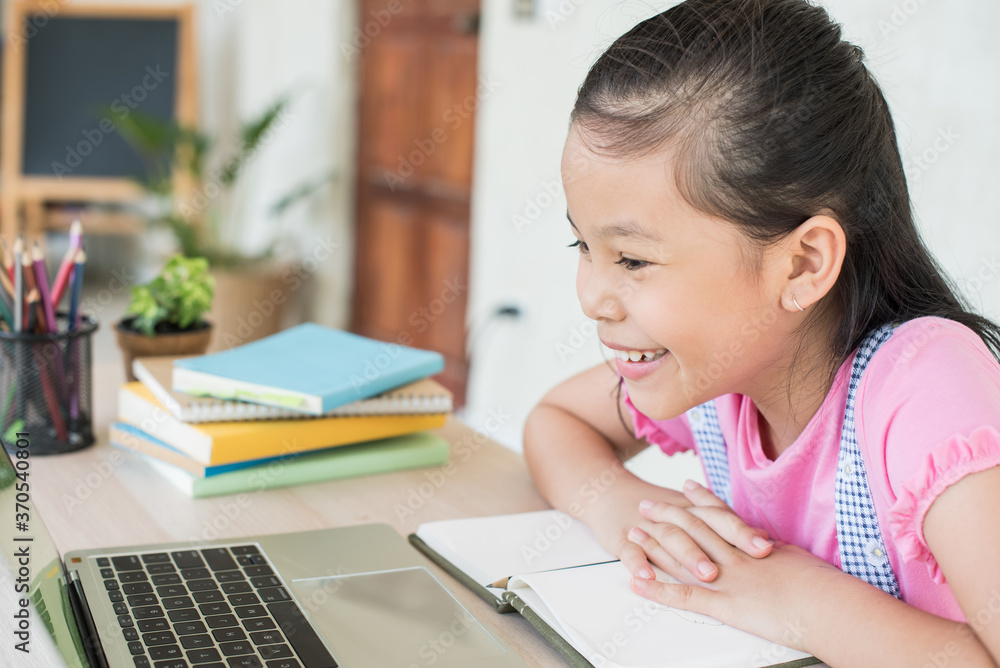 asian girl student online learning study online with video call teacher. social distance during quarantine, self-isolation, online education concept, homeschool, stay at home entertainment. asian girl student online learning study online with video call teacher. social distance during quarantine, self-isolation, online education concept, homeschool, stay at home entertainment.