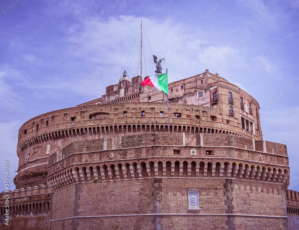 Rome Italy, Saint Angel castle with Italian flag under impressive sky
