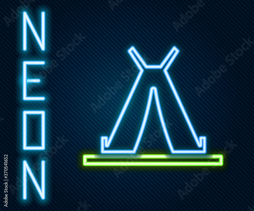 Glowing neon line Traditional indian teepee or wigwam icon isolated on black background. Indian tent. Colorful outline concept. Vector Illustration.