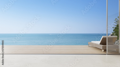 Canvas Print Lounge chair on terrace near living room in modern beach house or luxury villa