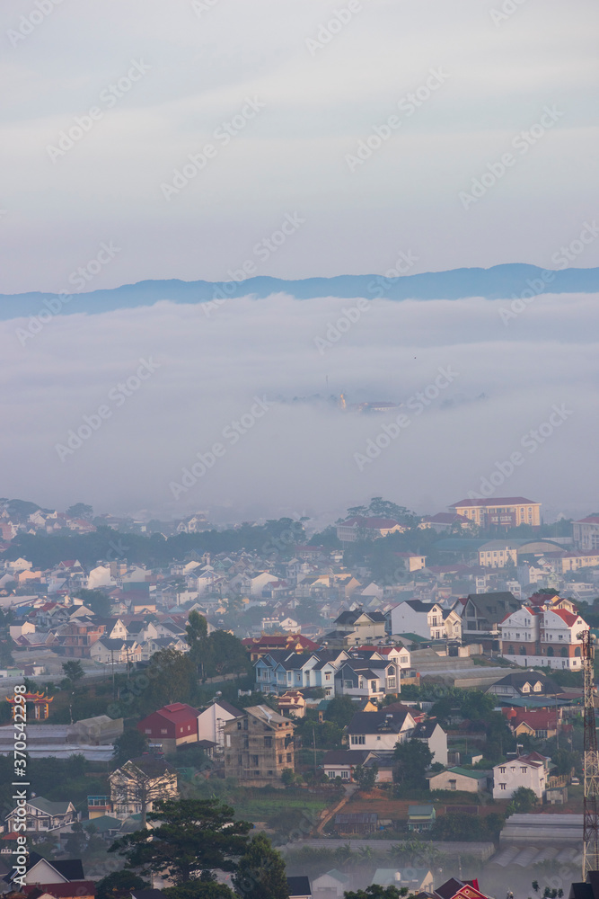 town of the fog at sunrise