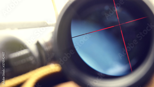 illuminated crosshair inside an optical sight rifle