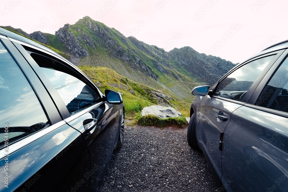 Cars against mountain