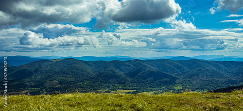 Fototapeta Naklejka Na Ścianę i Meble -  Mountain landscape with beautiful sky and clouds. Panorama of Bieszczady in Poland.