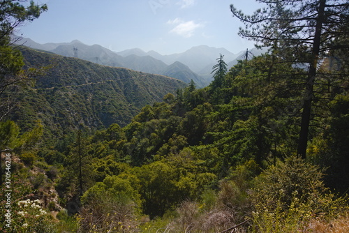 Angeles forest national park panoramic landscape, with mountain range peaks, changing terrain, of valleys rolling hills with trees, plants and mount brush. Scenic views and beautiful,