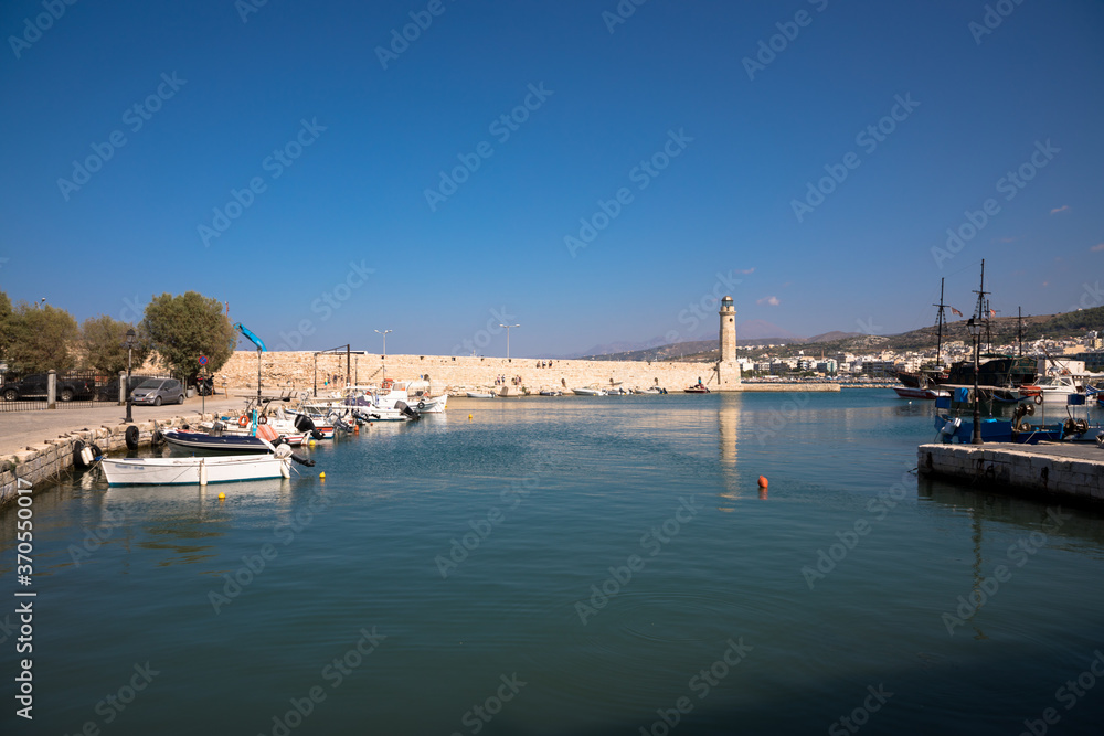 Lighthouse at the entrance to the old Venetian harbour, Rethymno, Crete, Greece