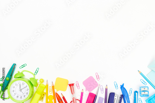 back to school, multicolored school supplies, rainbow on white background, flatley, copyspace