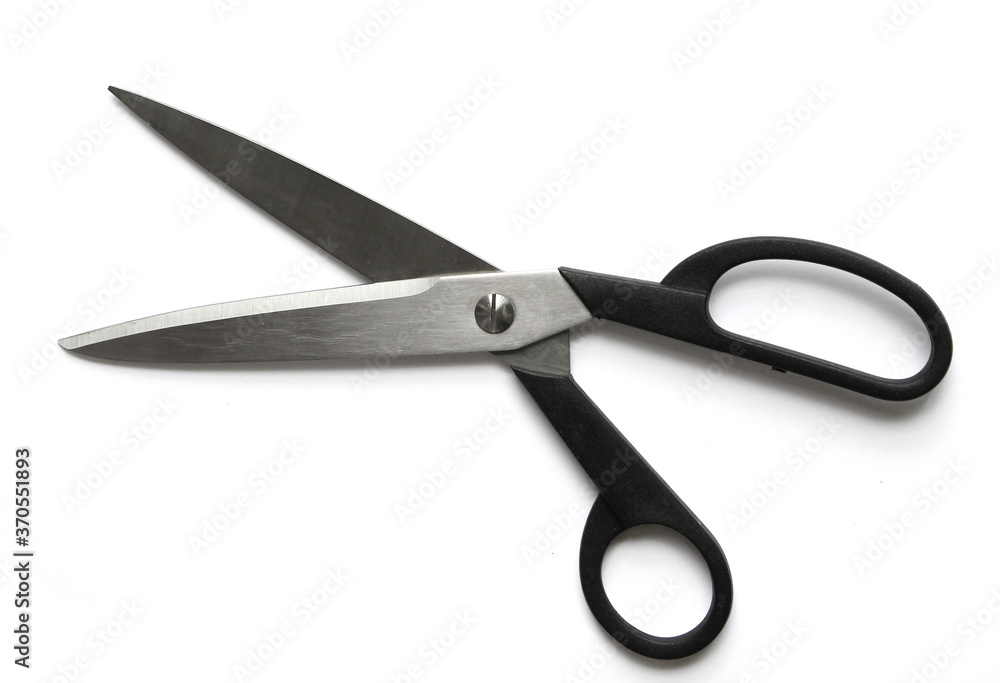 Scissors hand-operated cutting instruments. Scissors for cutting paper and thin materials, object is isolated on white background . Scissors hand-operated cutting instruments. Scissors for cutting paper and thin materials, object is isolated on white background .