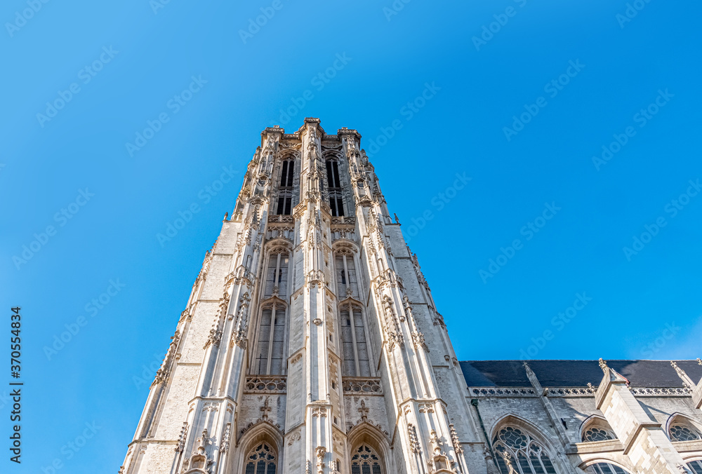 Tower of St. Rumbold's Cathedral in Brabantine Gothic style in the historic center of Mechelen, Belgium