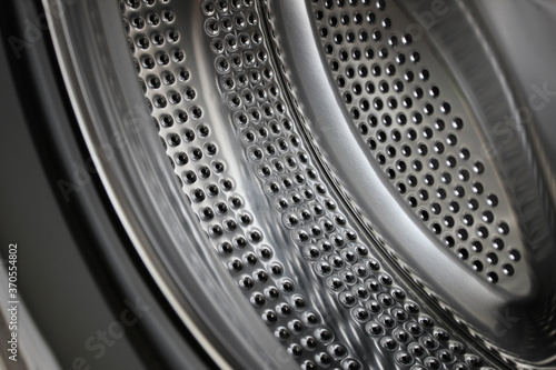 Inside of the washing machine drum . © binimin
