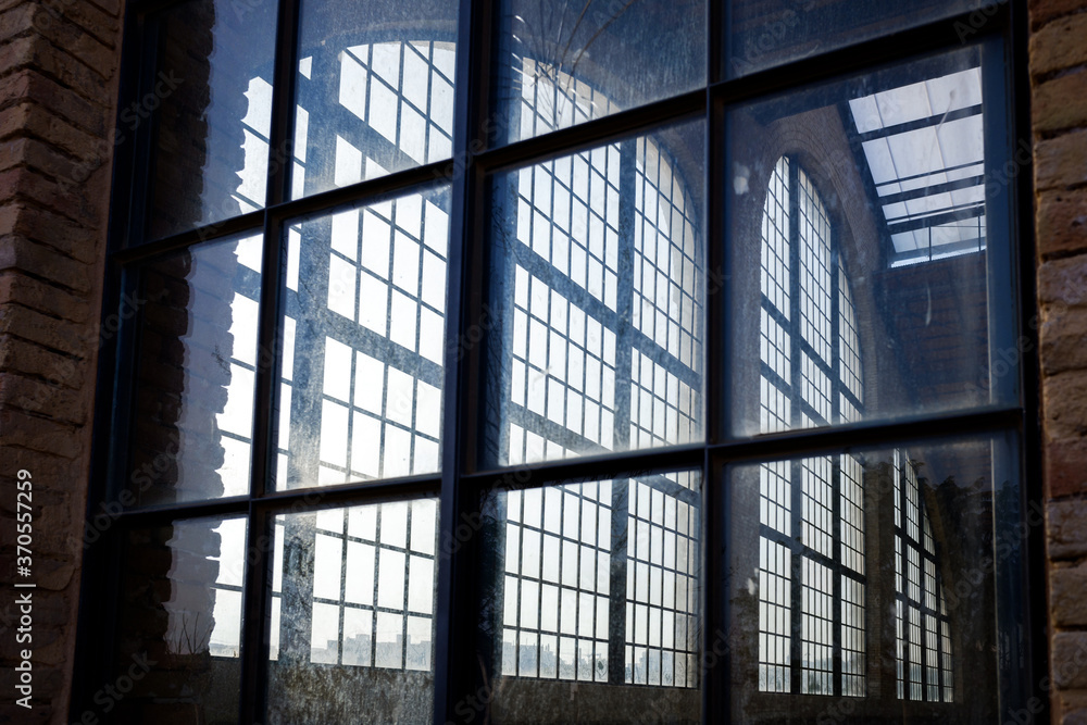 Vertical window of an old abandoned building. Vertical window of an old abandoned building.