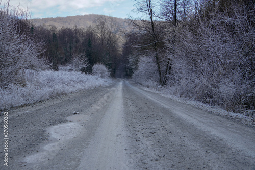 Scenic view of the road and frozen nature 