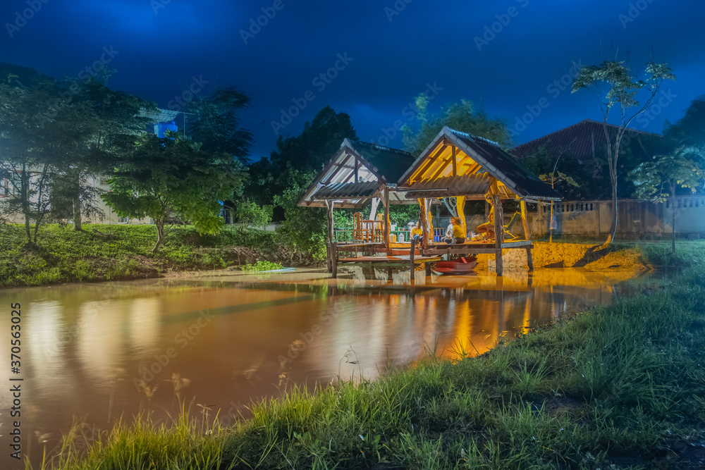 Fototapeta premium Accommodation by the evening water