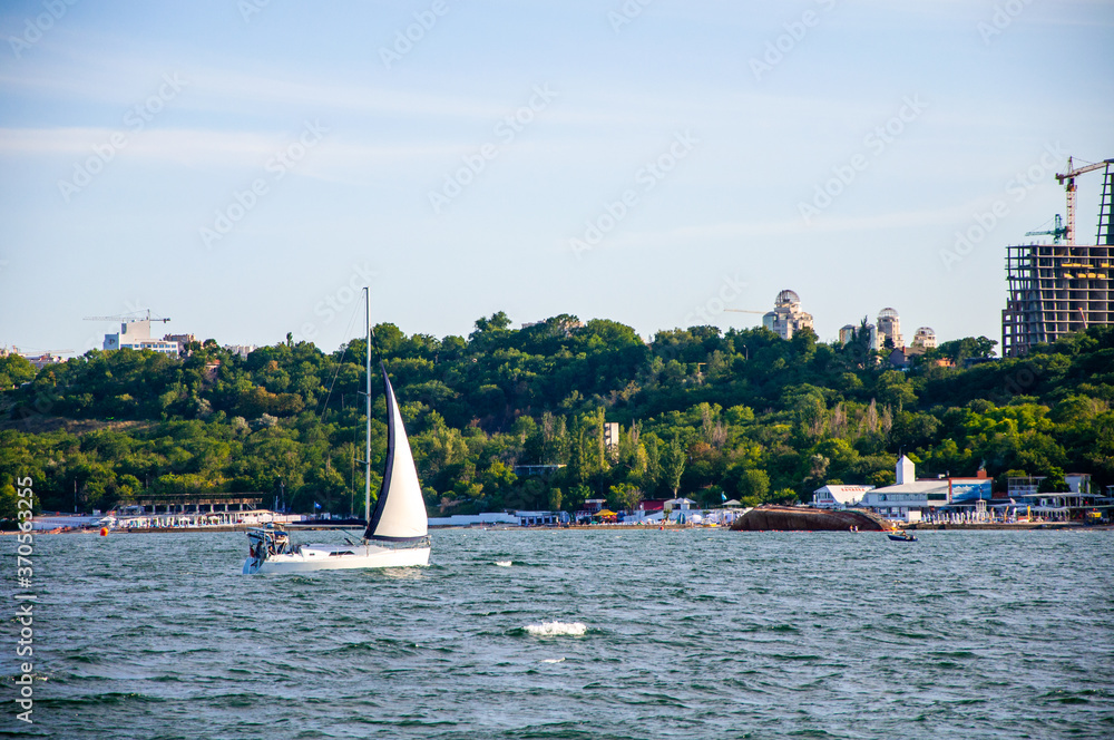 Obraz premium White sail on the sea. Sailing. Sailing competitions.