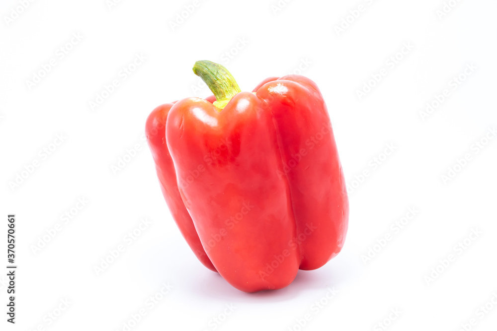 The red bell pepper isolated on a white The red bell pepper isolated on a white