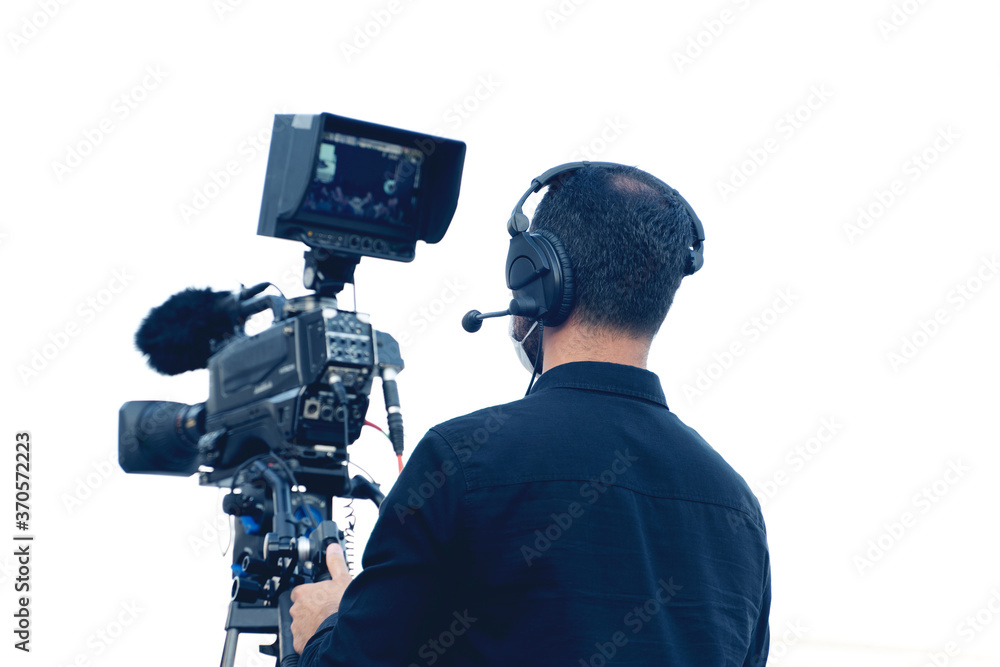 Cameraman on the set of the ultimate concert show. Masked against coronavirus Cameraman on the set of the ultimate concert show. Masked against coronavirus