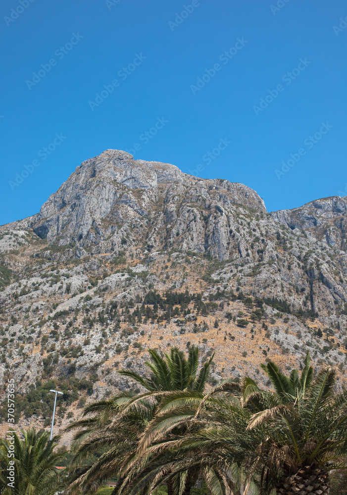 The rugged mountains surrounding the historic walled city of Kotor, Montenegro