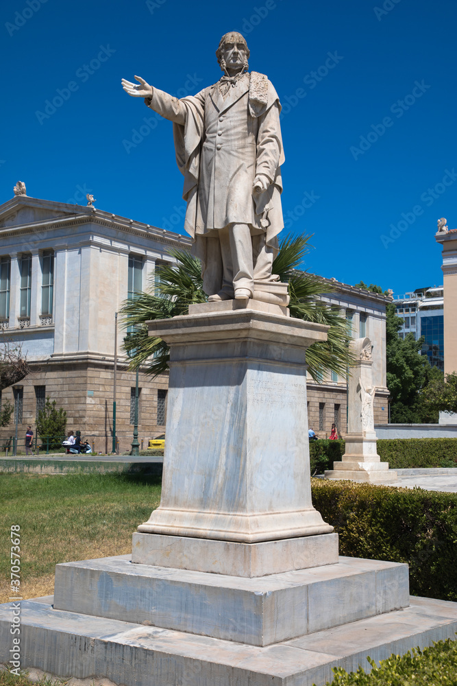 Statue in front of the old University of Athens building, Athens, Greece