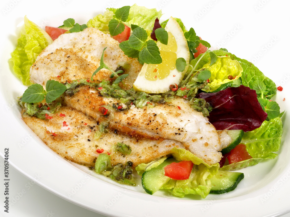 Plaice Fish Fillet with Salad on white Background - Isolated Plaice Fish Fillet with Salad on white Background - Isolated
