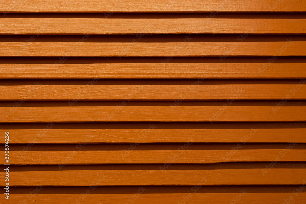 Wooden orange background from boards for splash Wooden orange background from boards for splash