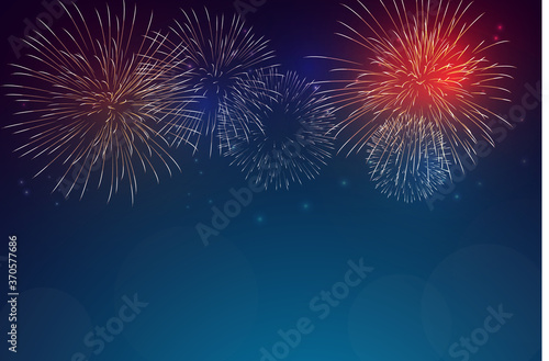 Colorful firework on twilight blue background. Fireworks for festive event.