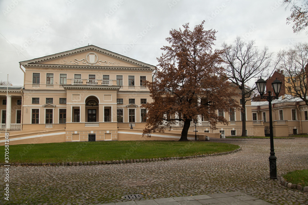 A small lawn in front of an old aristocratic estate