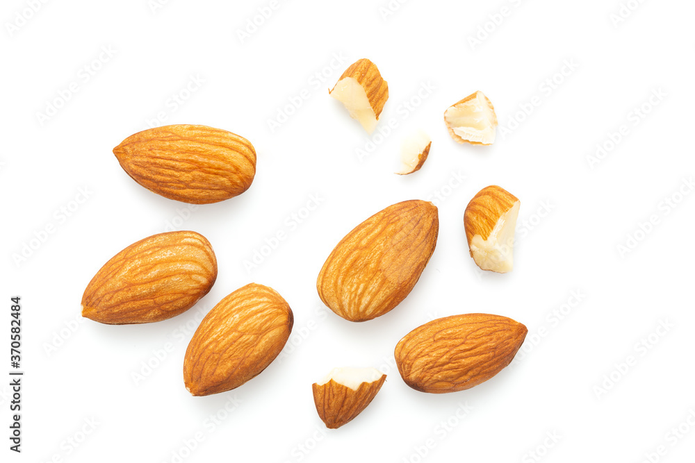Almonds and Mint leaves isolated on white background Almonds and Mint leaves isolated on white background
