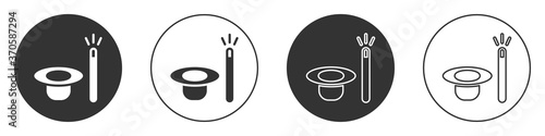 Black Magic hat and wand icon isolated on white background. Magic trick. Mystery entertainment concept. Circle button. Vector.