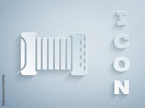 Paper cut Musical instrument accordion icon isolated on grey background. Classical bayan, harmonic. Paper art style. Vector.