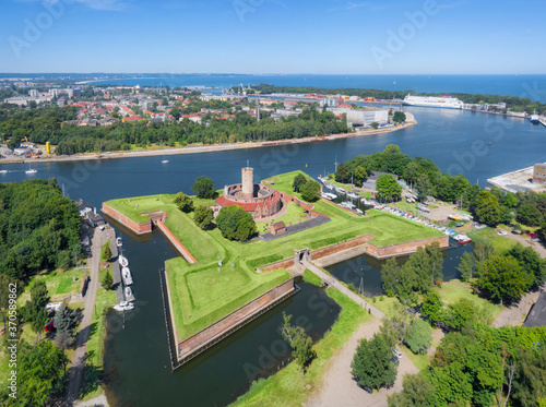 Aerial view of historic Wisloujscie Fortress - large fort at the confluence of the Vistula river into the bay Gdansk Bay on Baltic Sea