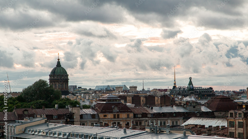 Saint Petersburg cloudy cityscape with rooftops and cathedral domes