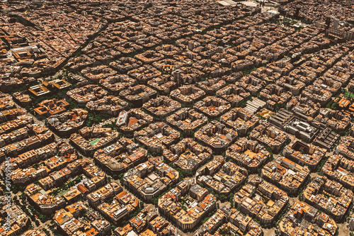 Aerial view of typical buildings of Barcelona cityscape from helicopter. top view, Eixample residencial famous urban grid