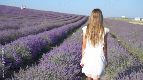 Wallpaper Mural Woman in lavender flowers field at sunset in white dress and hat Torontodigital.ca