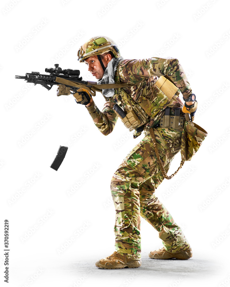 Army soldier in Protective Combat Uniform holding Special Operations Forces  Combat Assault Rifle isolated on white background Stock Photo | Adobe Stock