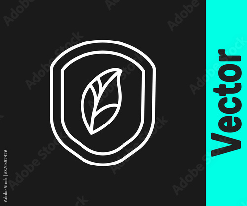 White line Shield with leaf icon isolated on black background. Eco-friendly security shield with leaf. Vector Illustration.