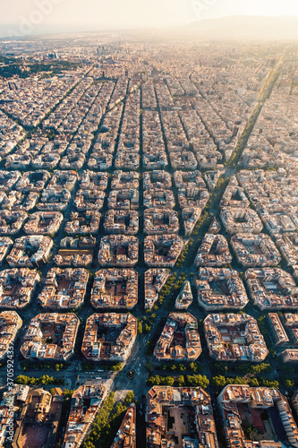Aerial view of typical buildings of Barcelona cityscape from helicopter. top view, Eixample residencial famous urban grid photo