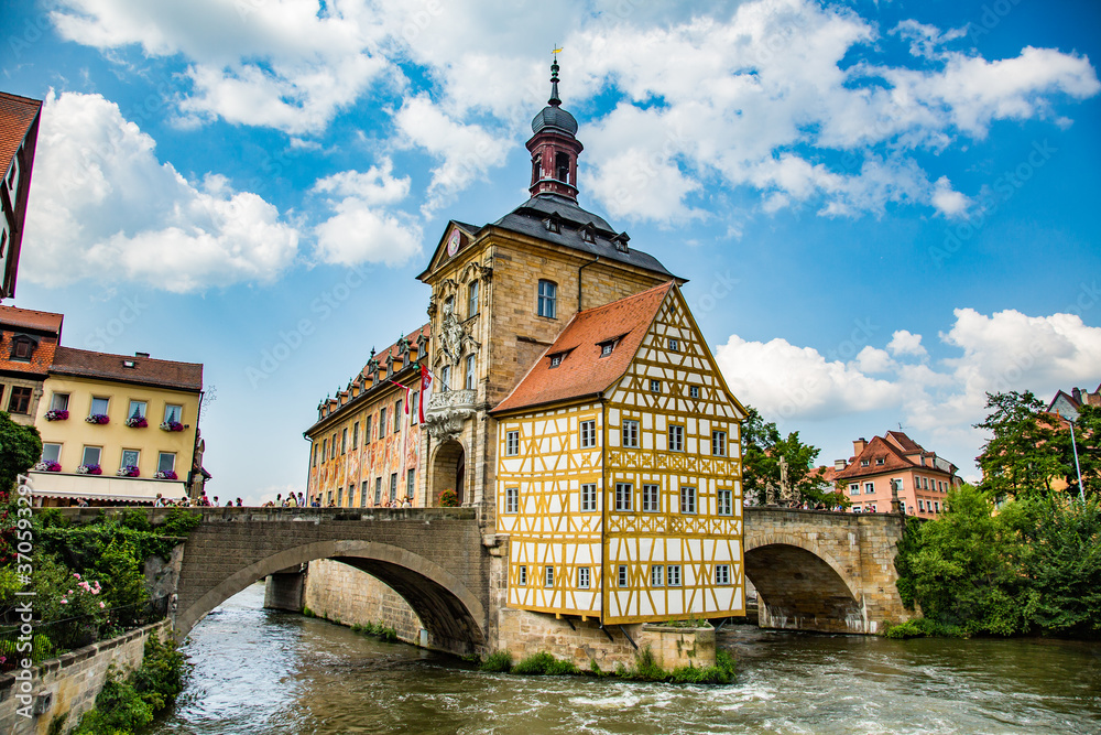 Bamberg, Germany - 7/6/2013:  The Bamberg city hall sits on a island in the river Regnitz in downtown Bamberg, a UNESCO world heritage site