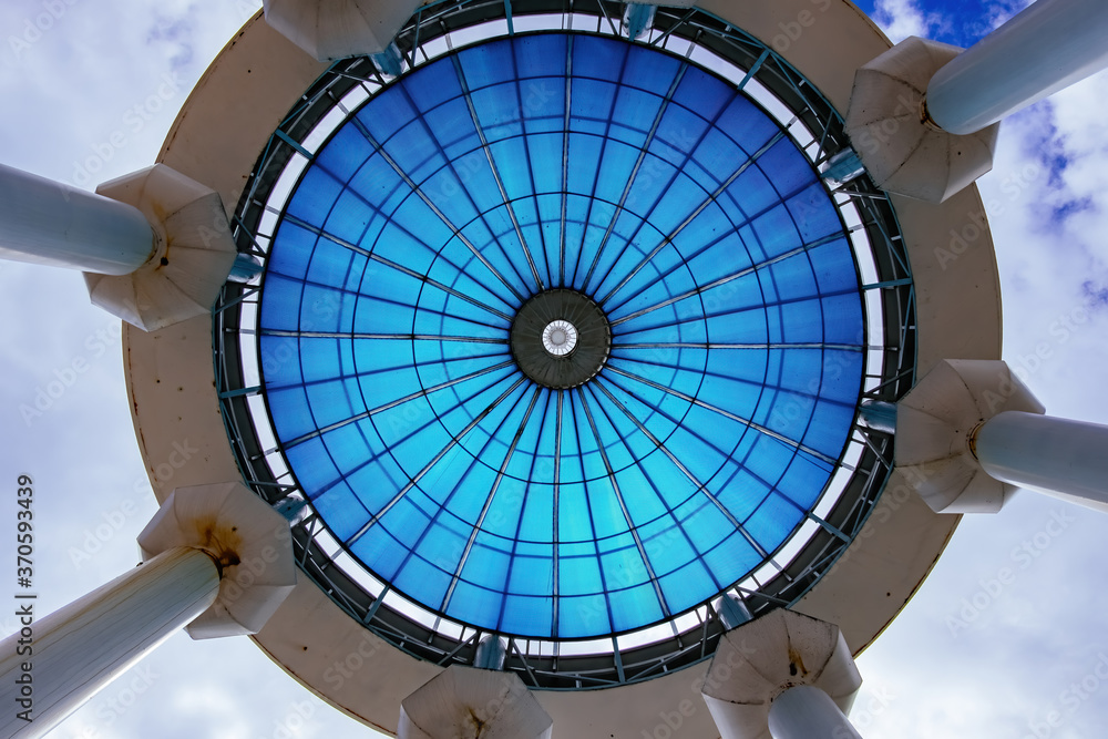 Blue glass transparent dome, bottom view at sunny day