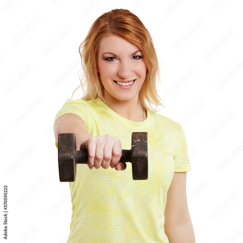 Frau trainiert mit Hantel