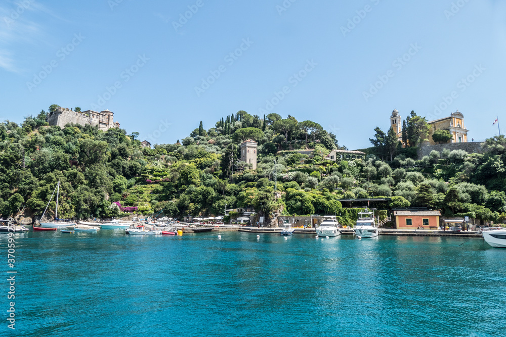 The bay of Portofino with the castle and the church of San Giulio